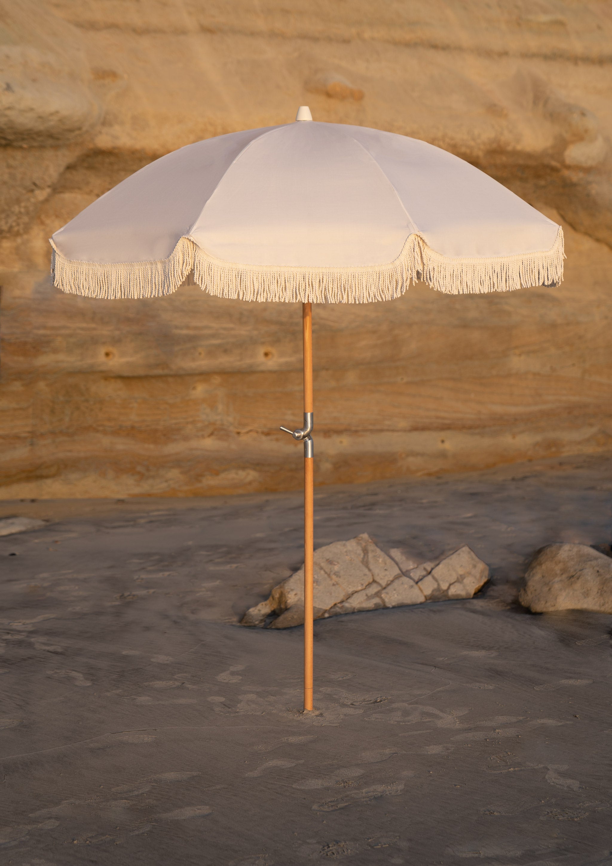 finkle fringed patio umbrella from 1950s Wind & Sea Classic White Fringe Tassel Patio & Beach Umbrella