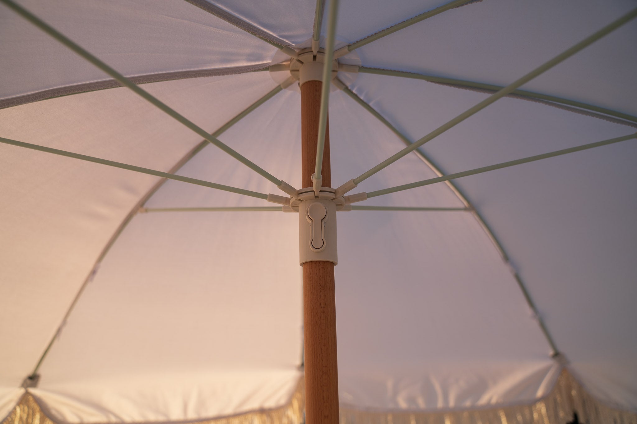 finkle fringed patio umbrella from 1950s Wind & Sea Classic White Fringe Tassel Patio & Beach Umbrella